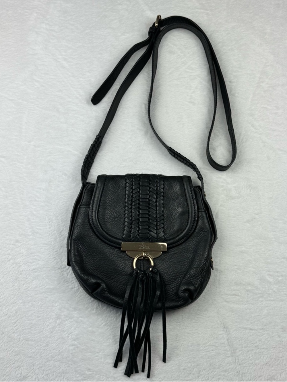 Kooba Sedona Leather Braided Crossbody Bag. Gold tone hardware. Front fringe.